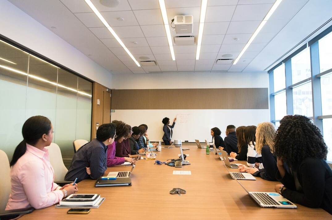 business leader in meeting