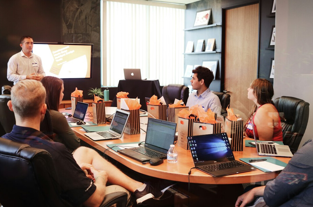 business leader in meeting